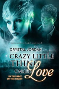 Crazy Little Thing Called Love cover - a woman with short blond hair and fairy wings in the foreground and a dark-haired man in the background